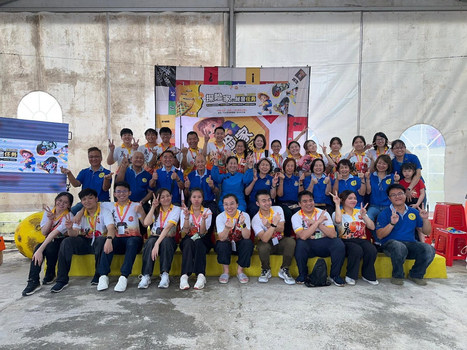 Chi Hui Youth Club volunteers and community partners at a public service event
